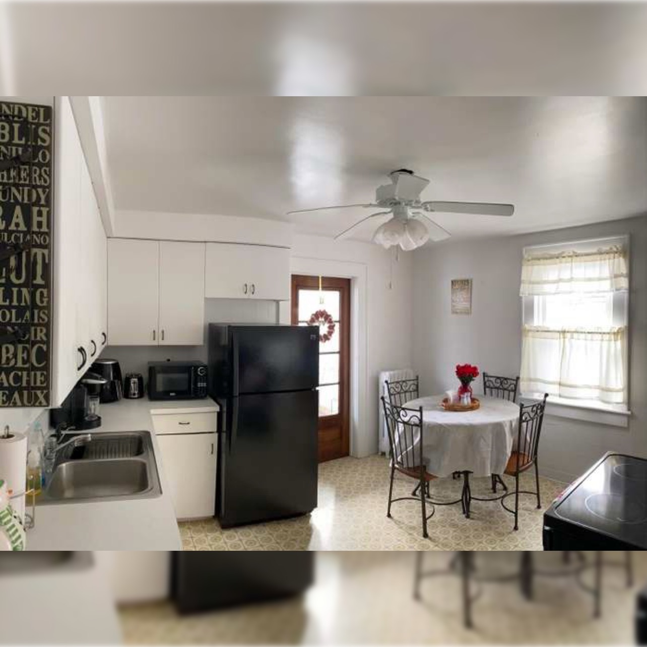 Kitchen in the South Webster Avenue three-unit at purchase